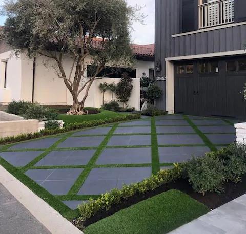 Front yard with artificial turf and strong curb appeal