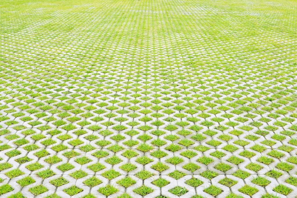 Eco-conscious artificial turf yard with no sprinklers running