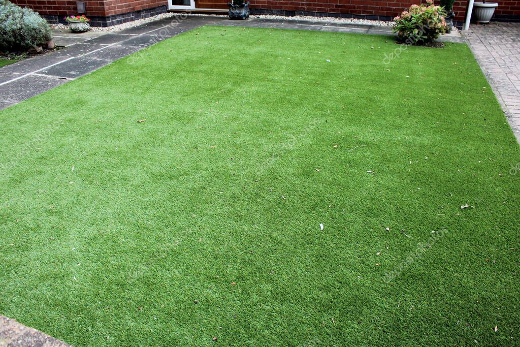 Low-maintenance artificial grass front yard
